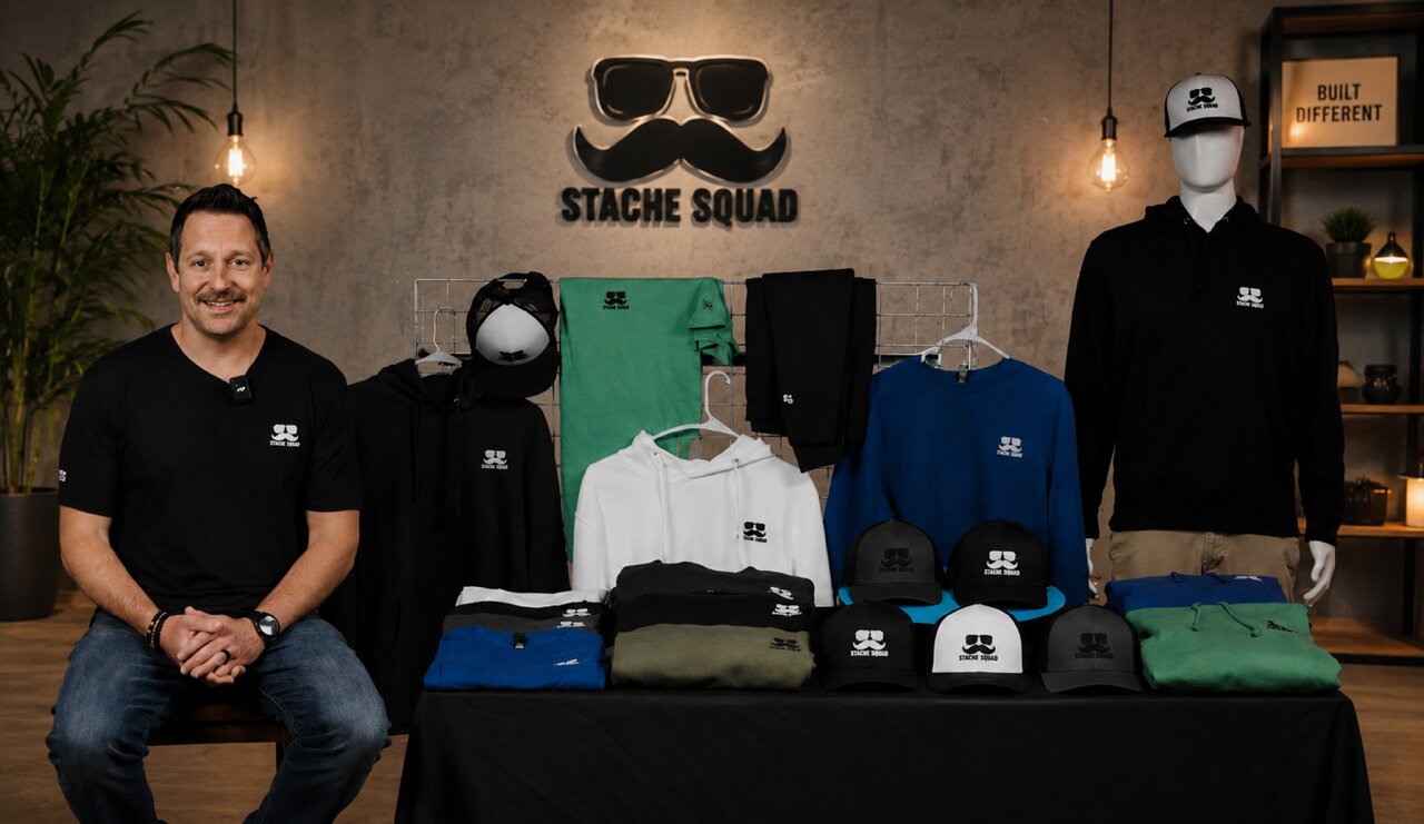 Stache Squad founder with the full apparel lineup